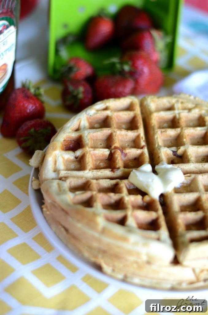 A beautifully plated stack of Maple Bacon Waffles