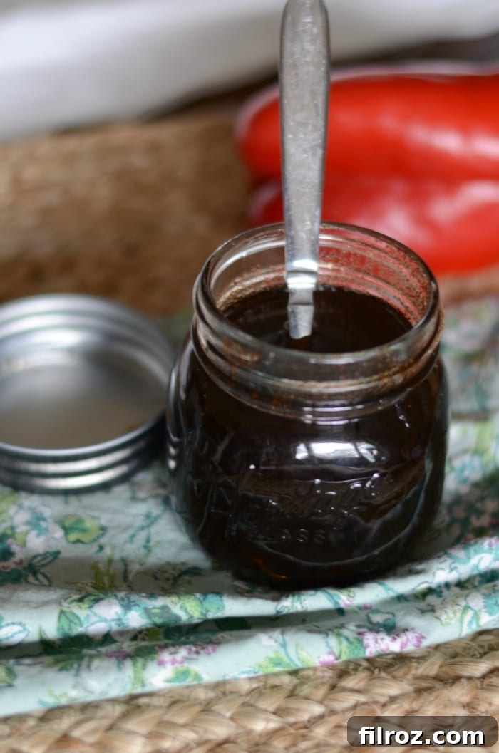 Glass of spiced cold brew coffee with a beautiful swirl of cream