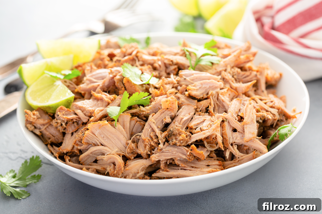The best crock pot pork carnitas recipe served with tortillas and toppings