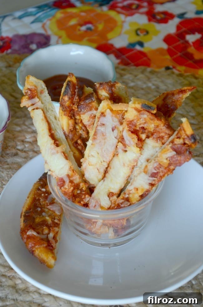 Close-up of a pizza dipper ready to be enjoyed