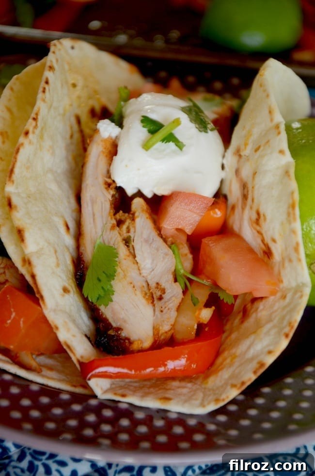 Colorful bell peppers and chicken ready for the oven