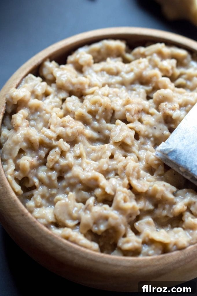 Chai Latte Oatmeal in a bowl with a spoon