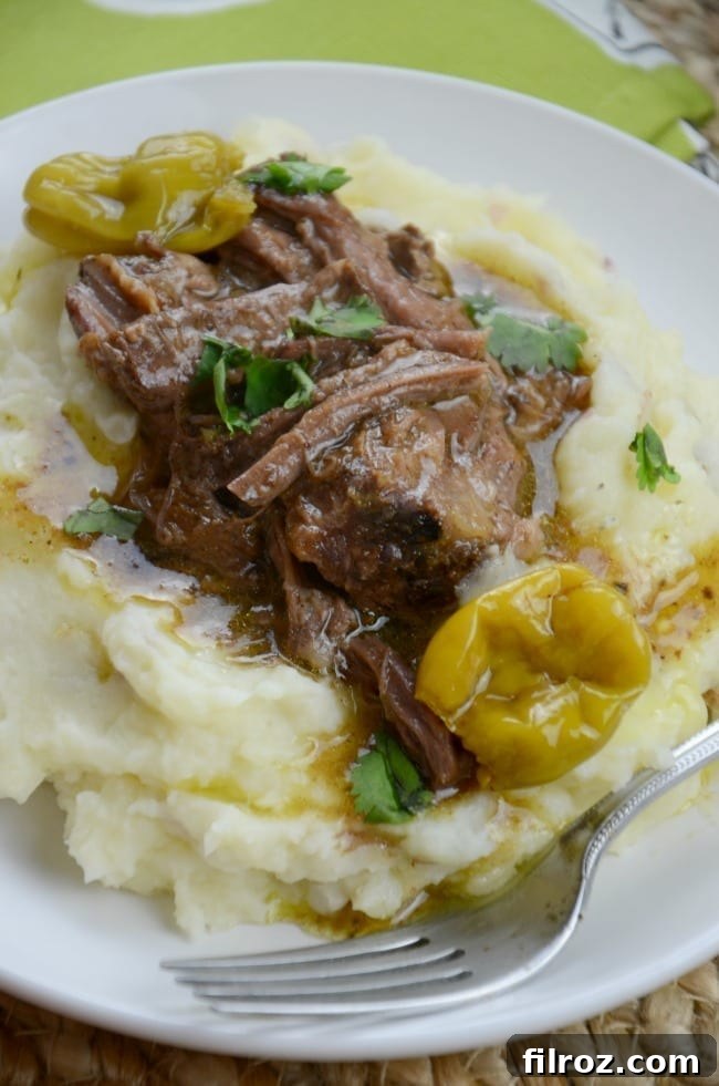 Original Mississippi Pot Roast recipe, showcasing the simple ingredients layered in a slow cooker before cooking.