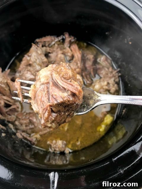 Gluten-free Mississippi Pot Roast, perfectly shredded and ready to be served.
