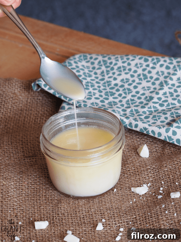 Delicious white chocolate sauce in a jar