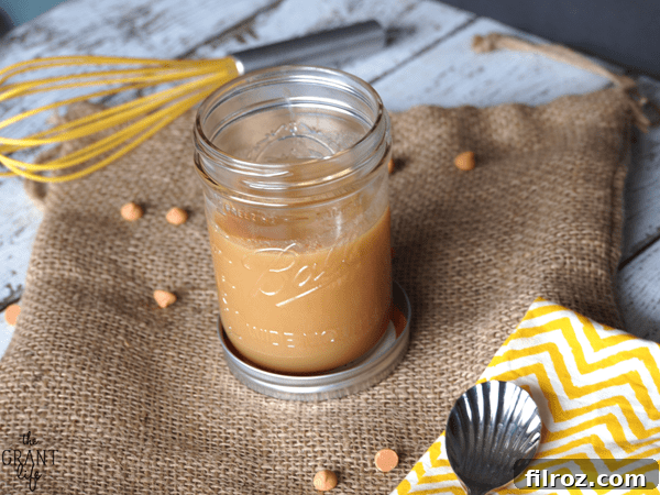 Smooth homemade butterscotch sauce in a bowl