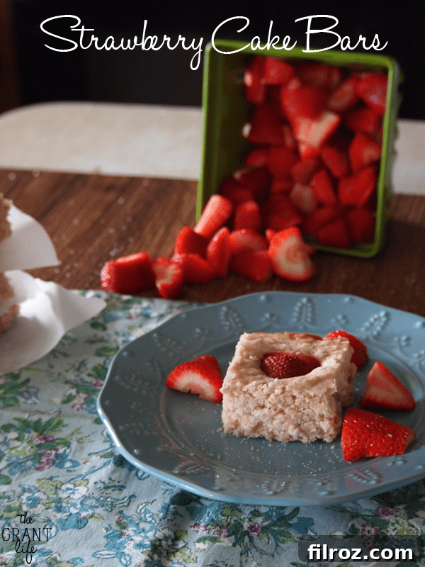 Buttery Sugar Cookie Bars 12 Delicious strawberry cake bars with white frosting
