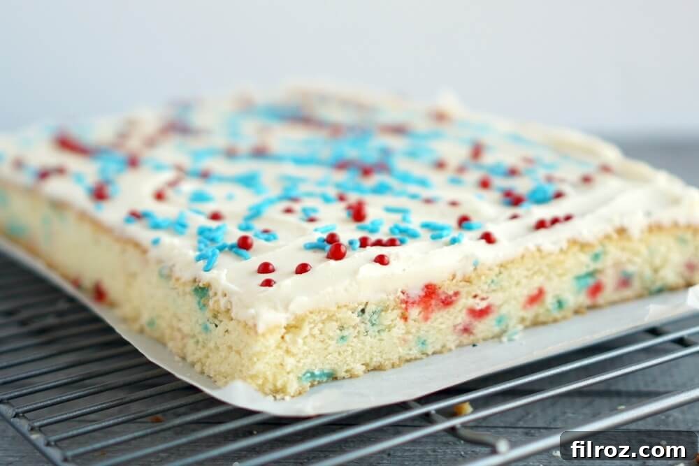 Buttery Sugar Cookie Bars 9 Sliced sugar cookie bars with sprinkles on a serving platter
