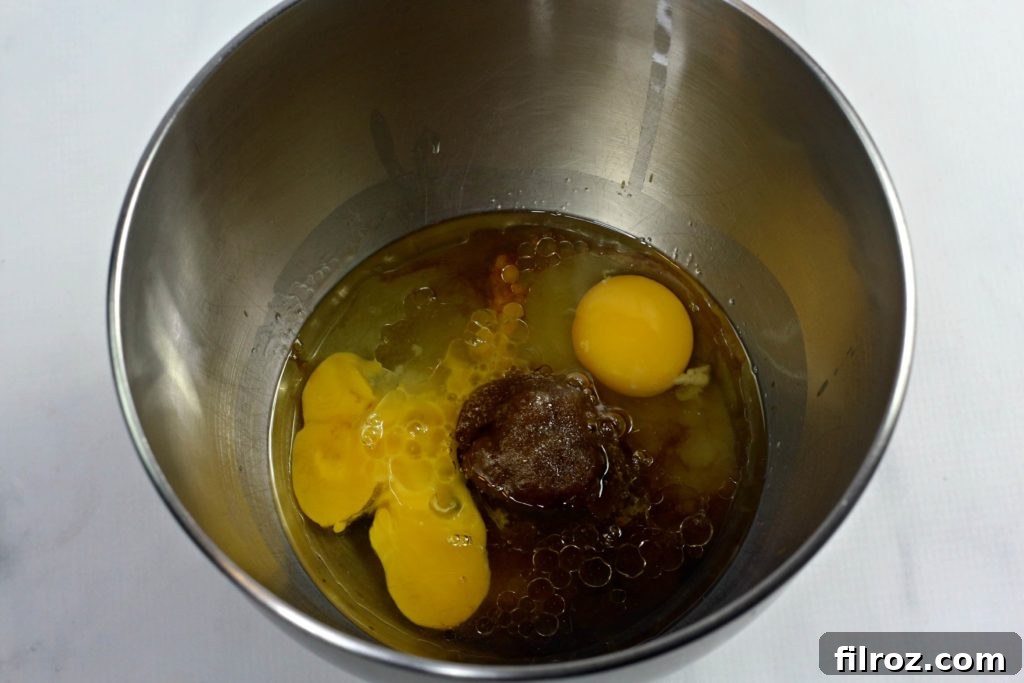 Mixing dry ingredients for homemade pumpkin bread batter