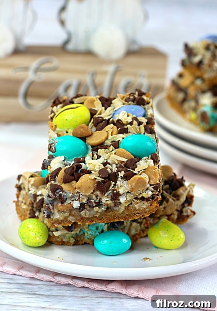 Easy Easter Magic Cookie Bars, layered dessert with M&Ms