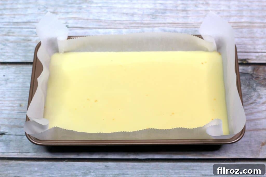 Layering toppings over the condensed milk