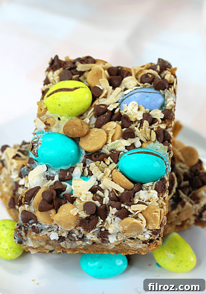 Beautifully arranged Easter Magic Cookie Bars on a white plate