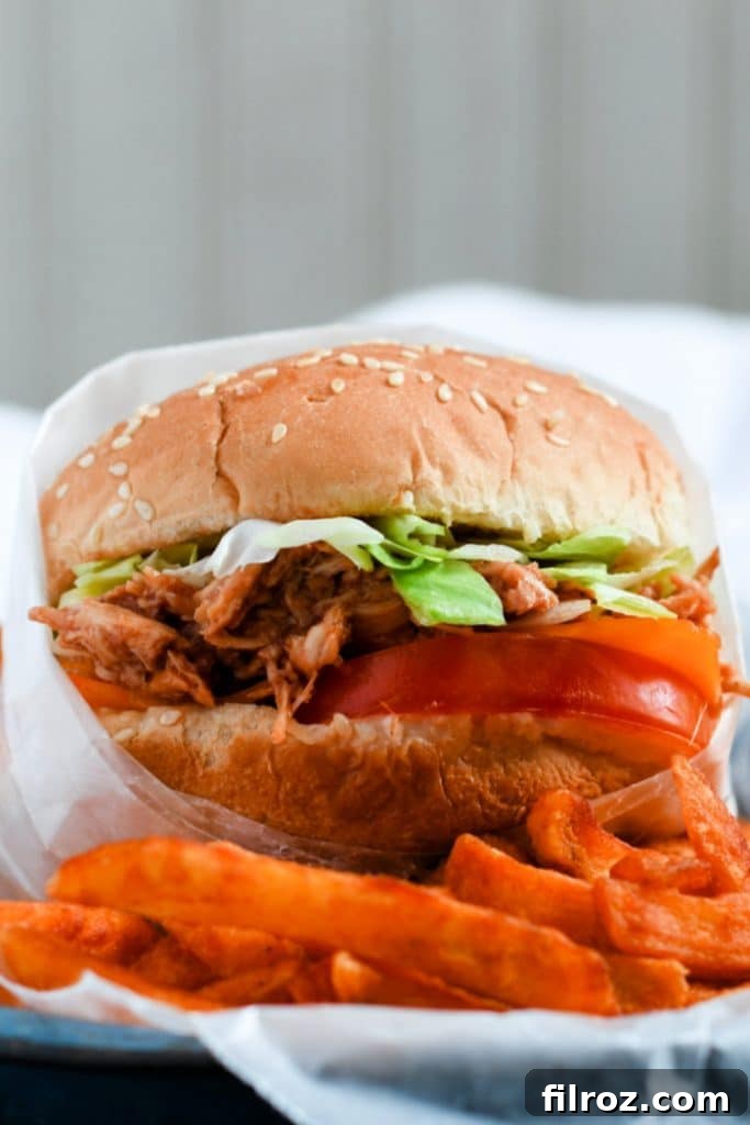 Sweet and Smoky BBQ Chicken Sandwich 8 Easy BBQ chicken sandwich plated with side dishes