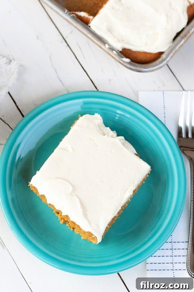 Spiced Pumpkin Bars with Cream Cheese Frosting 3 Pumpkin bars ready to be frosted with cream cheese