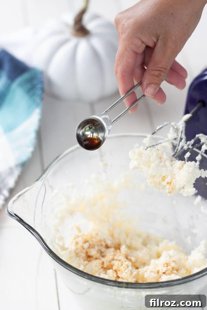 Spiced Pumpkin Bars with Cream Cheese Frosting 9 Creaming butter and cream cheese for frosting