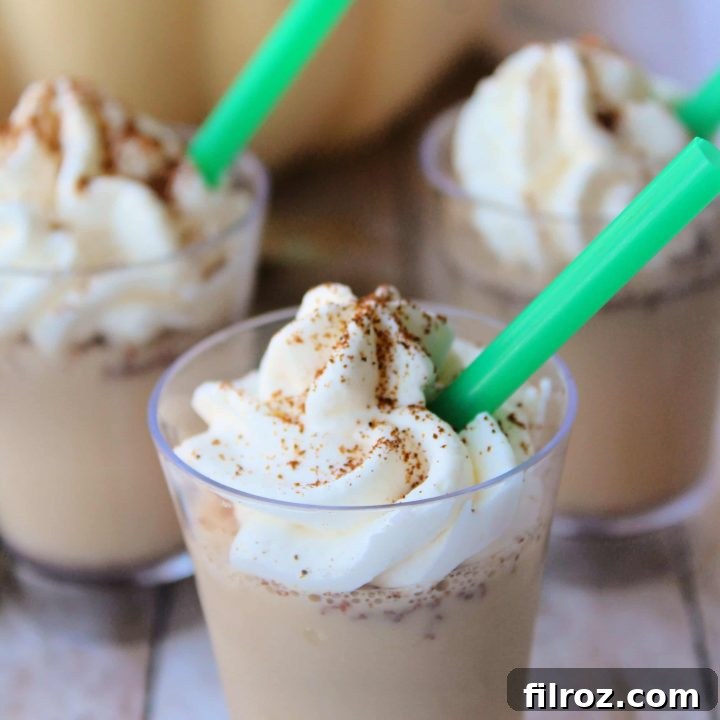 The best pumpkin shots for fall, garnished with whipped cream and spice