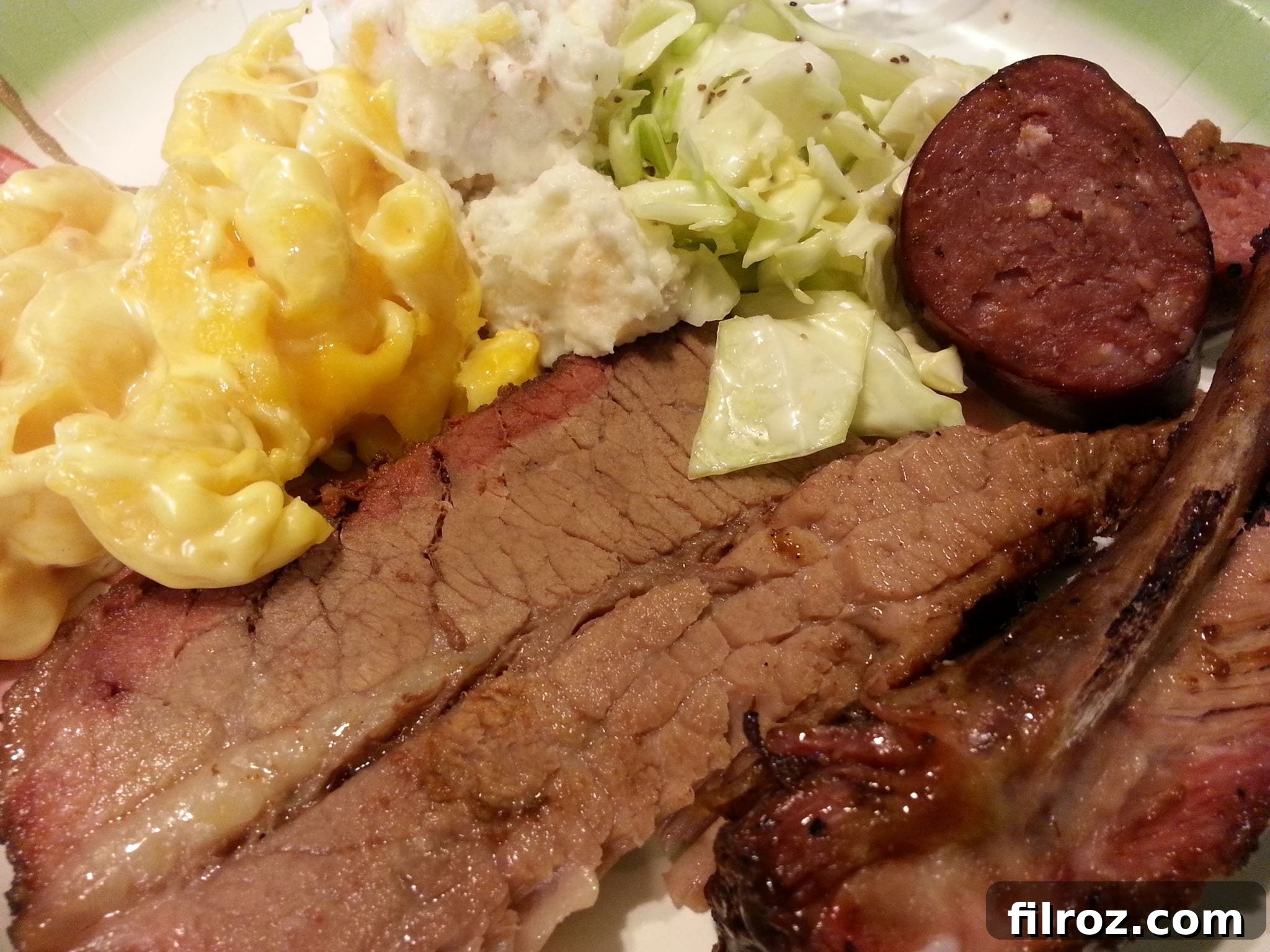 Close-up of perfectly smoked ribs and sides from Bohunk Barbecue, ideal for event catering in Denton.