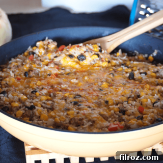 Delicious Fiesta Rice Skillet with melted cheese