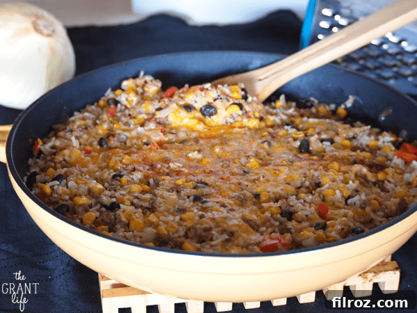 Fiesta Rice Skillet ready to be shared on Pinterest