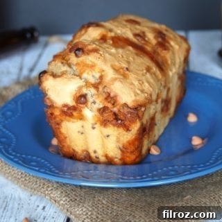 Delicious Butterscotch Pecan Beer Bread, a quick and easy homemade treat.
